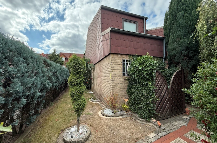 Immobilie kaufen Hollage: 4 Zimmer, 114 m², Garten, Wintergarten & Garage. KÄUFERPROVISIONSFREI.
